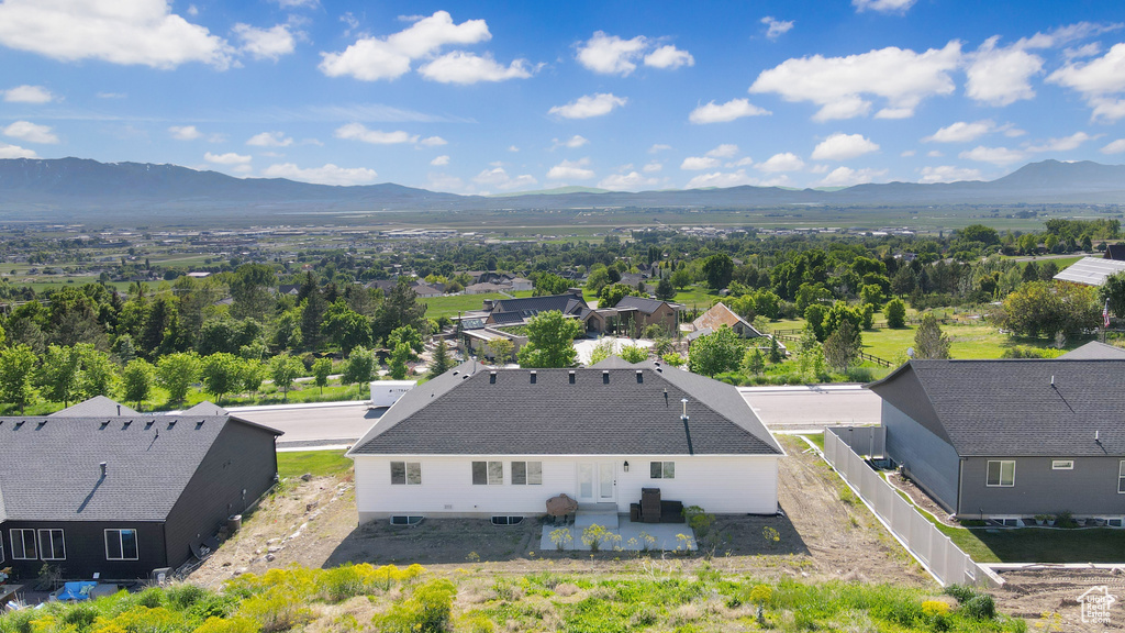 View of subject property featuring mountains