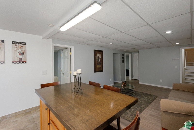 Dining area with stairs and recessed lighting