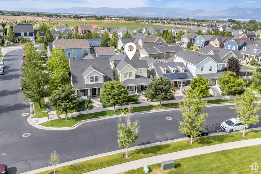 Aerial view of residential area with a mountainous background
