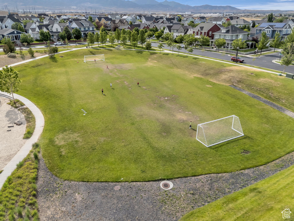 Aerial view of residential area with a mountain backdrop