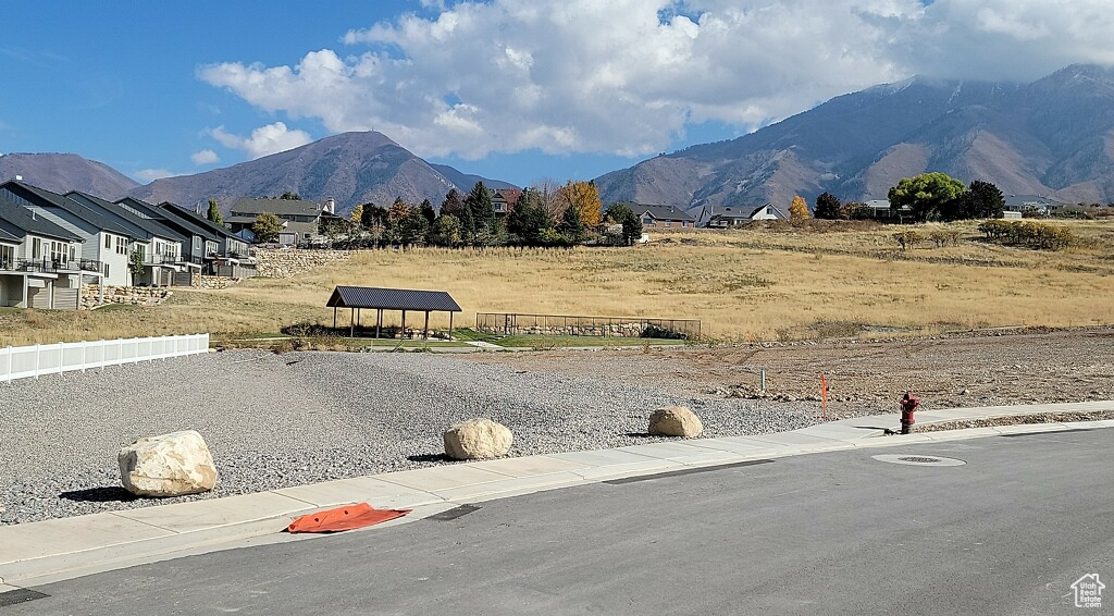 View of mountain backdrop with nearby suburban area