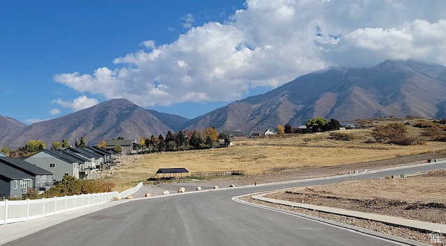 View of mountain backdrop with nearby suburban area