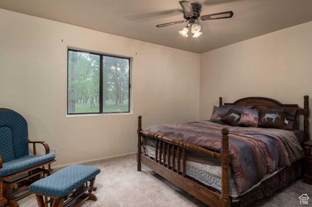 Bedroom featuring carpet floors and ceiling fan