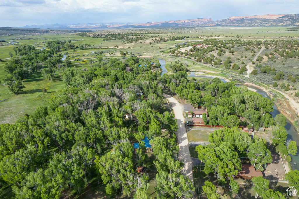 Aerial overview of property\'s location with a water and mountain view