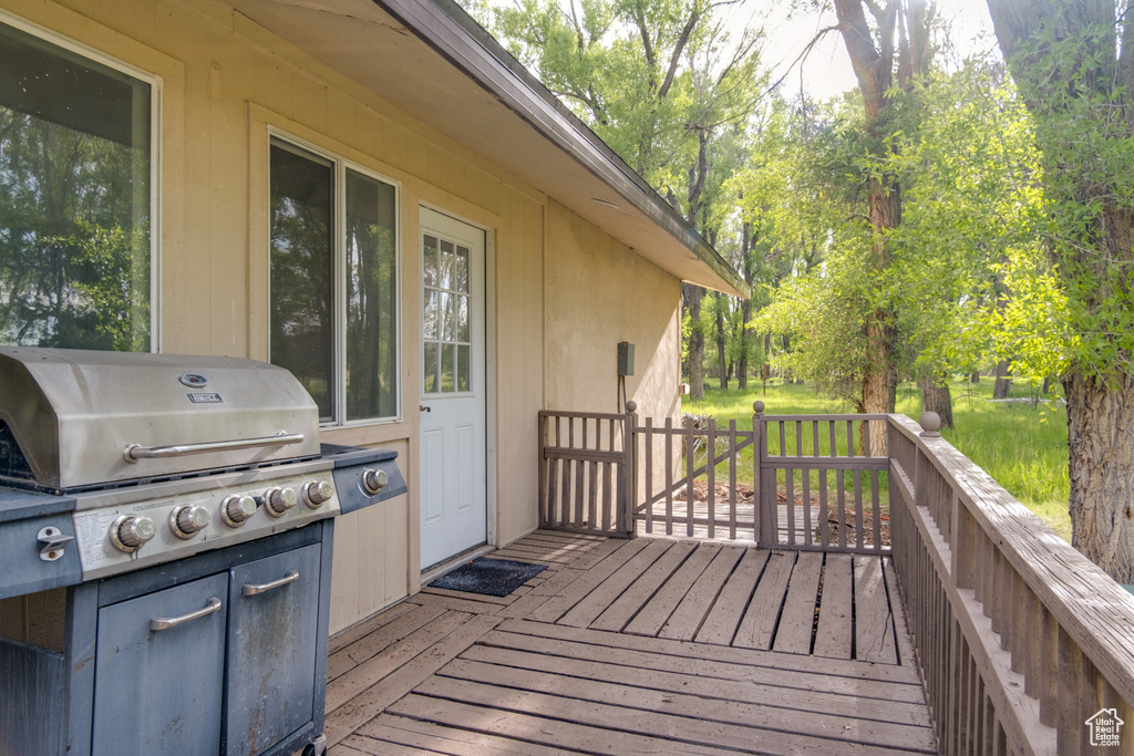 Wooden deck with a grill