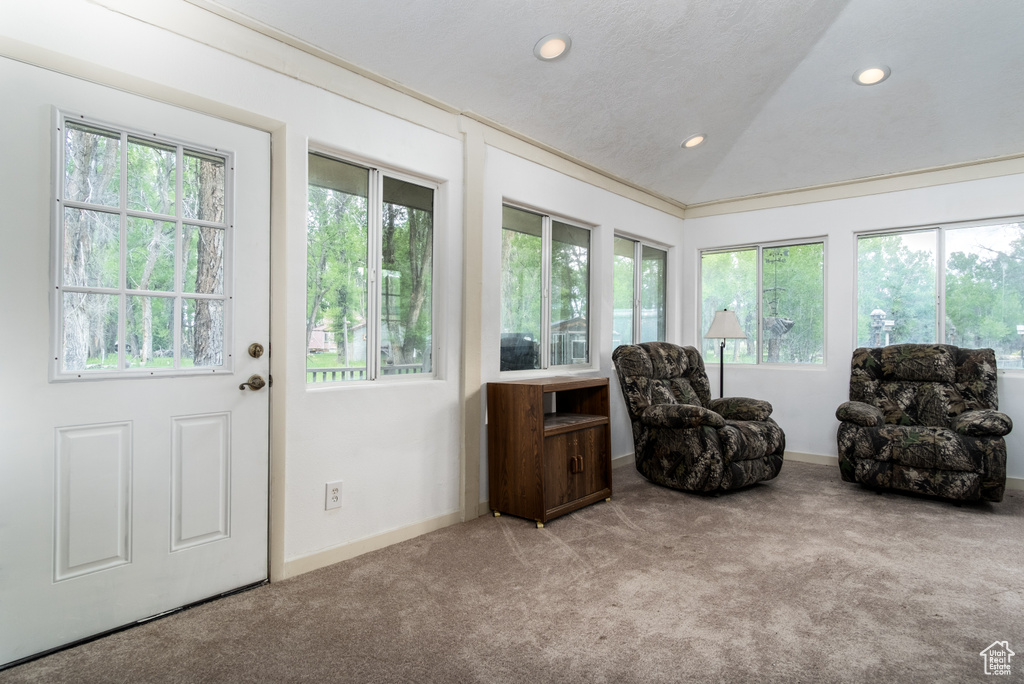 Sitting room with carpet, recessed lighting, and lofted ceiling