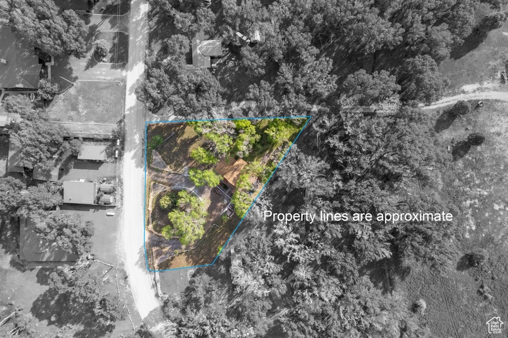 Aerial overview of property\'s location featuring property parcel outlined