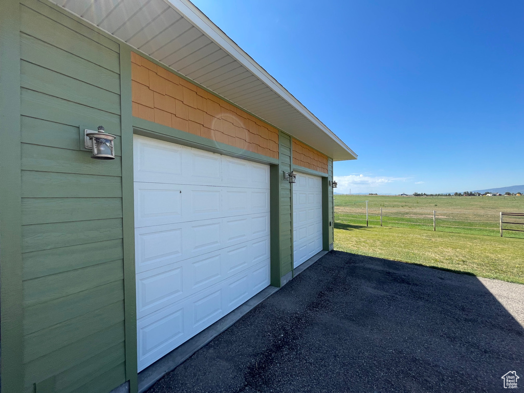 Garage featuring a view of countryside