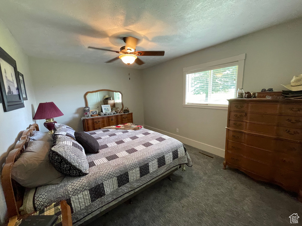 Bedroom featuring carpet floors and a ceiling fan