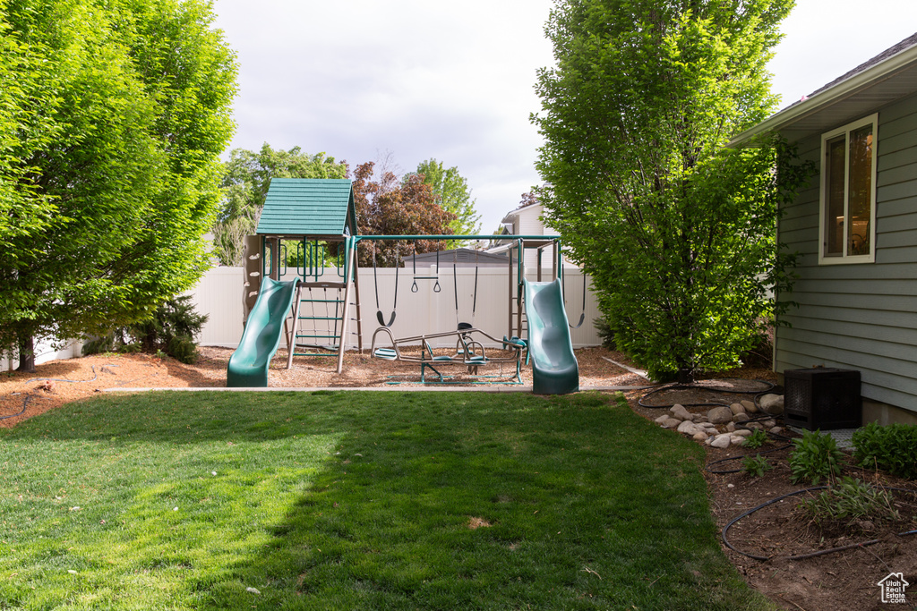 View of yard featuring a playground