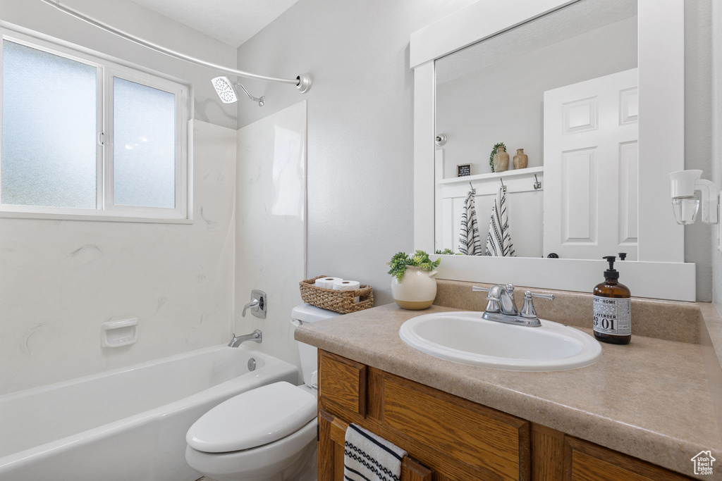Bathroom with vanity and shower / bathtub combination