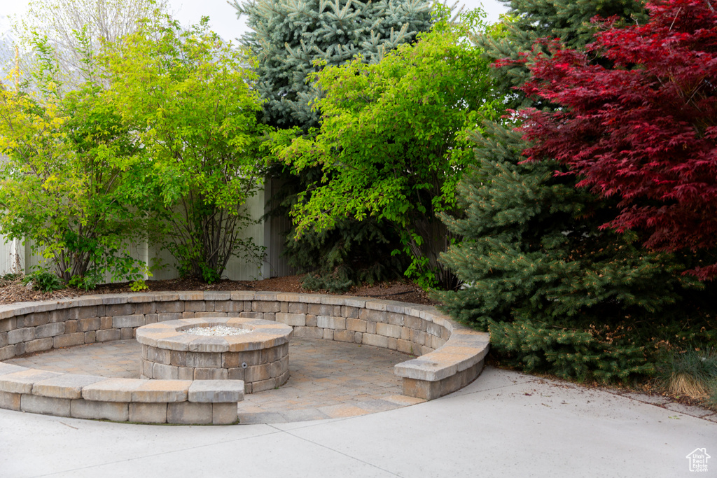 View of patio featuring a fire pit
