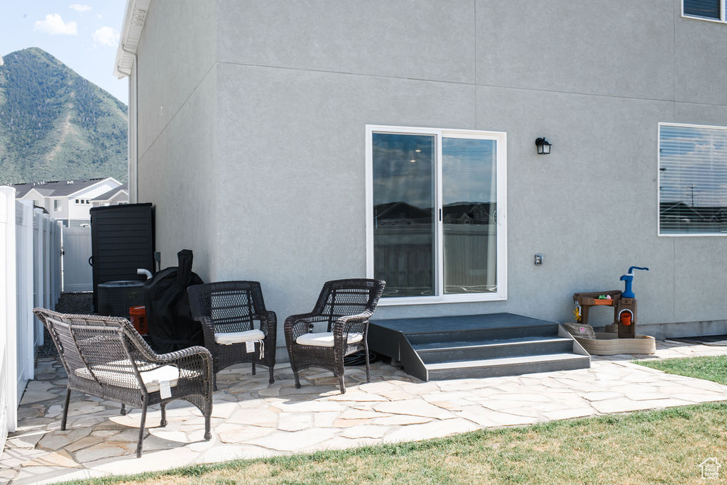 View of patio with a mountain view