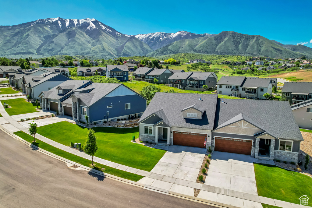 Aerial perspective of suburban area featuring mountains