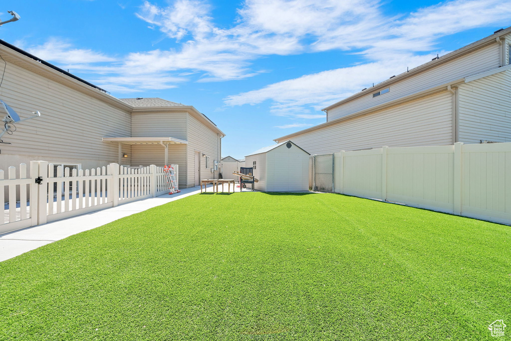 View of fenced backyard