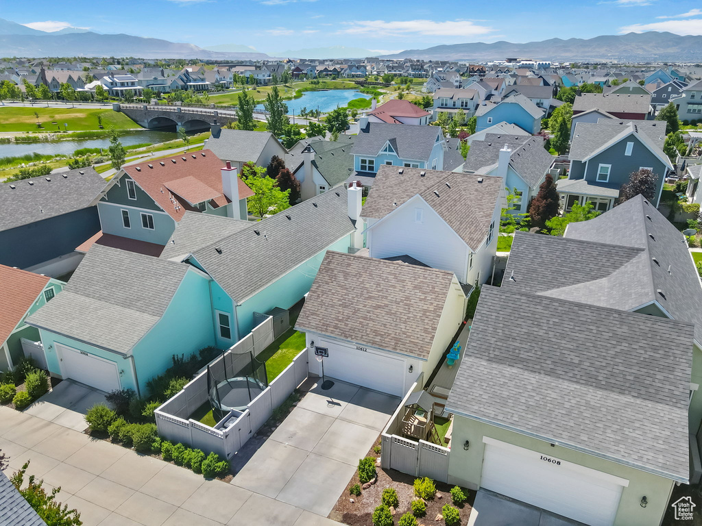 Aerial view of residential area with a water and mountain view