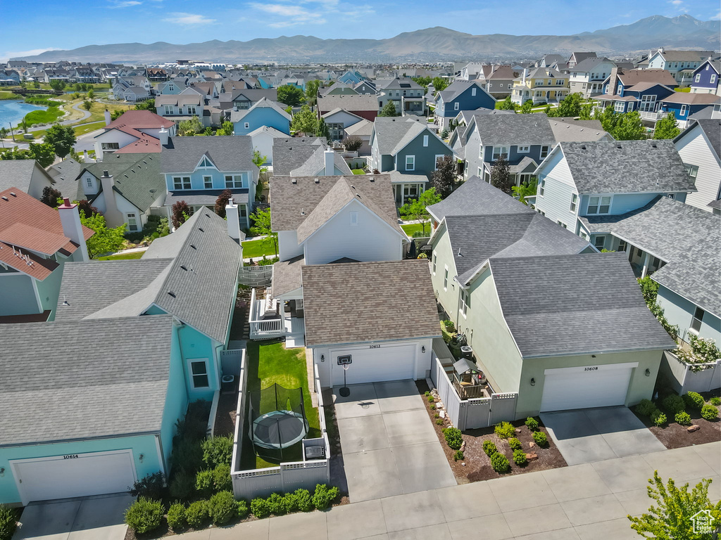 Aerial view of residential area with a mountain backdrop