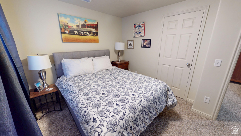 Bedroom featuring carpet floors
