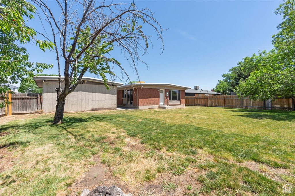 View of fenced backyard