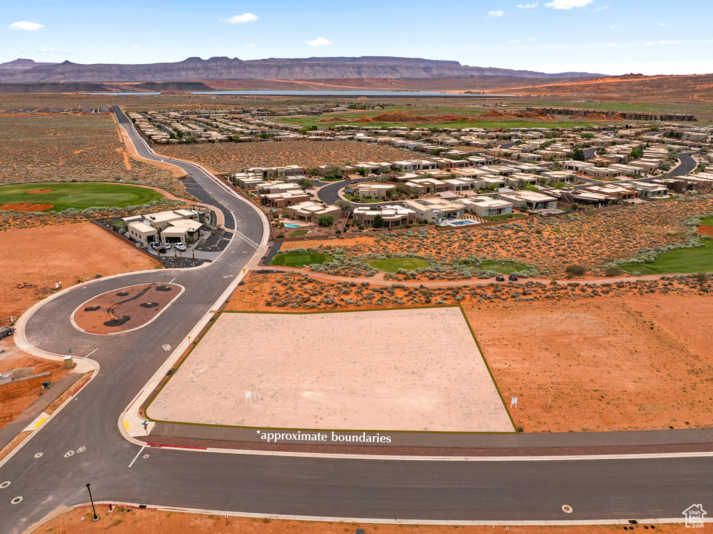 Aerial view of residential area featuring mountains