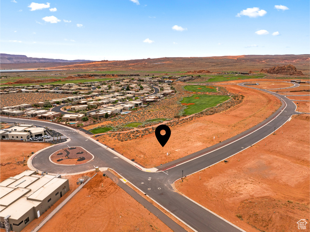 Aerial view of residential area with a mountain backdrop