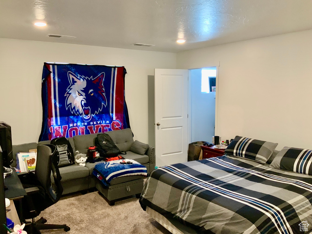 Bedroom featuring carpet