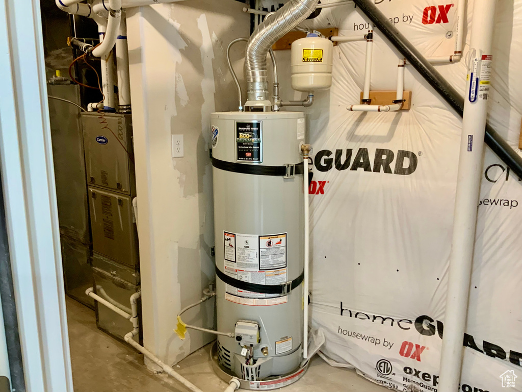 Utilities featuring strapped water heater