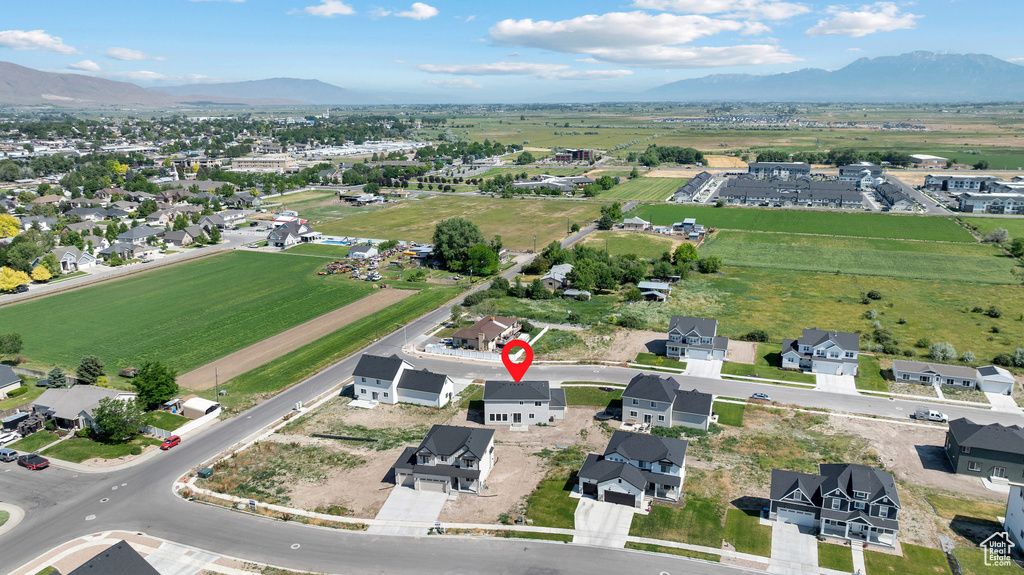 Aerial overview of property's location with a mountain backdrop