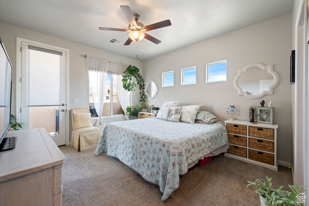 Bedroom with carpet floors and ceiling fan