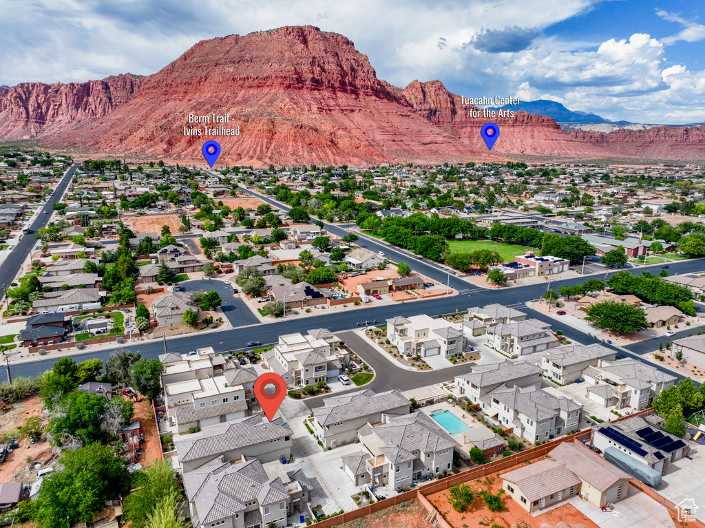 Aerial view of residential area with a mountain backdrop