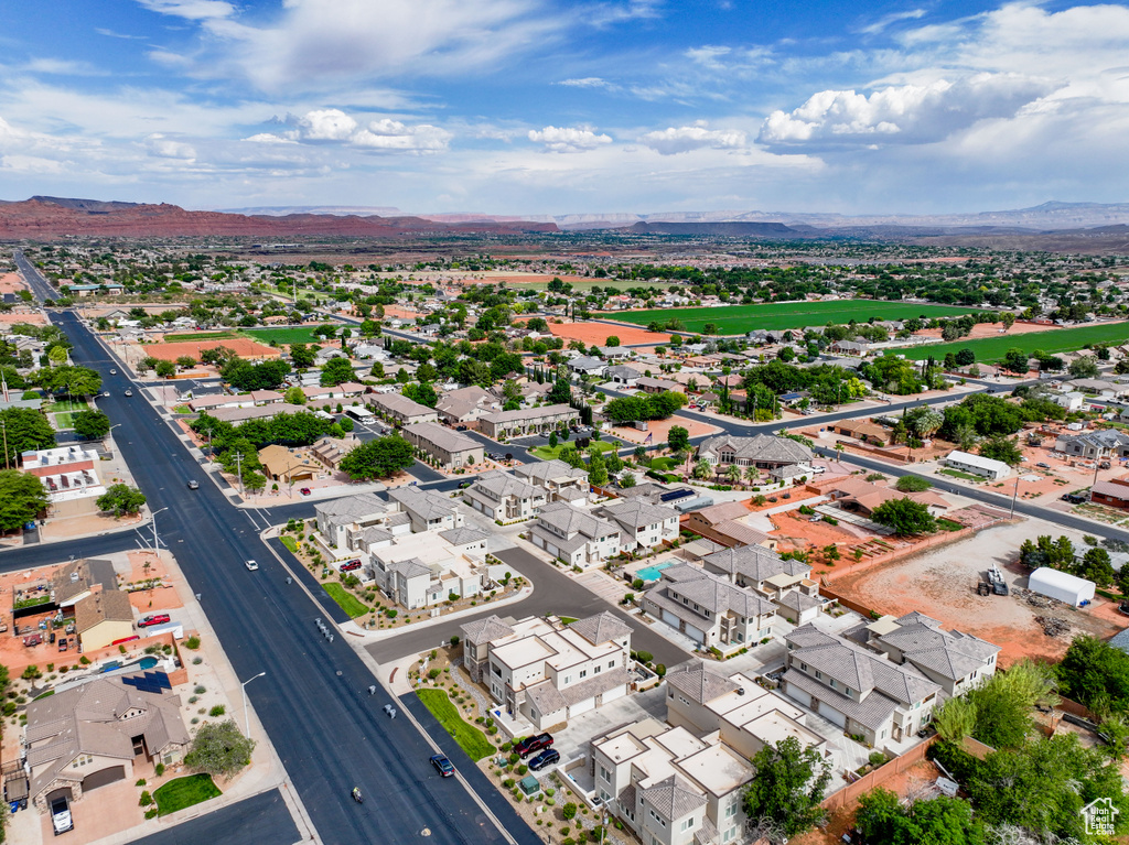 Aerial view of residential area with a mountain backdrop