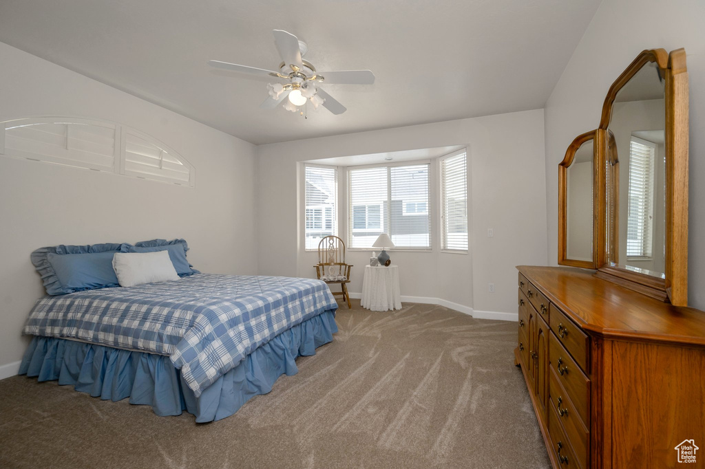 Bedroom with carpet floors and ceiling fan
