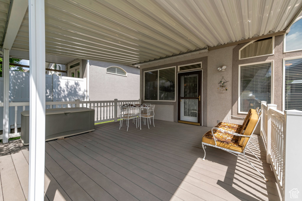 Wooden deck with outdoor dining space