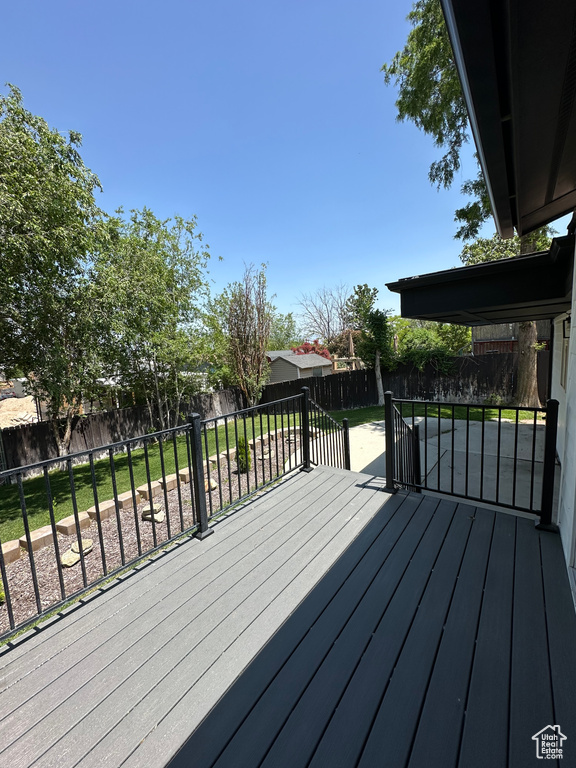 Deck with a fenced backyard
