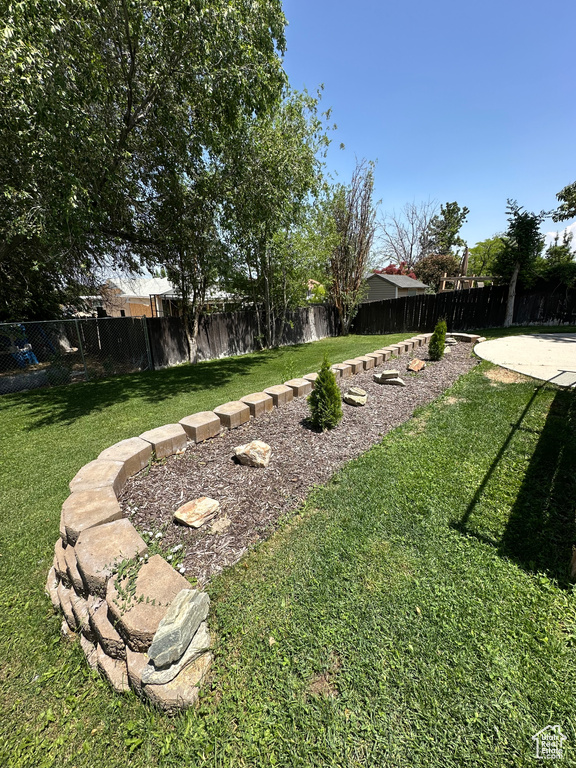 View of fenced backyard