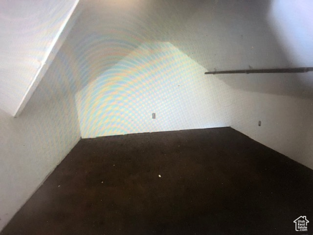 Bonus room with concrete flooring