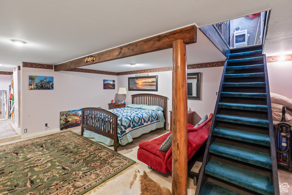 Bedroom with beamed ceiling