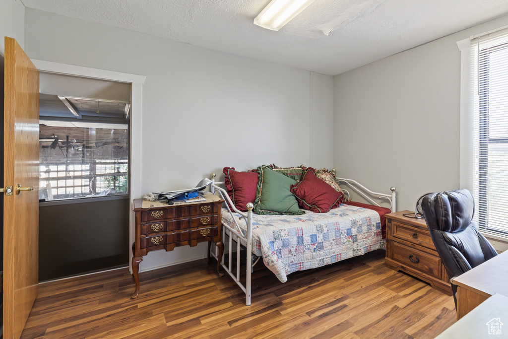 Bedroom featuring wood finished floors