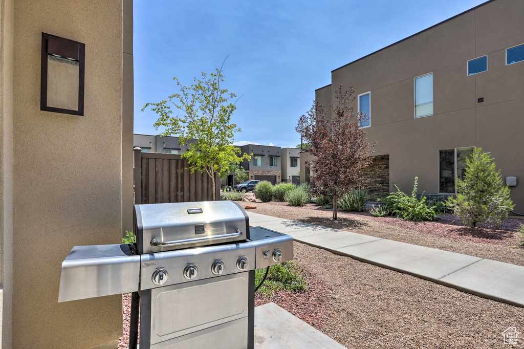 View of patio / terrace featuring grilling area and a residential view