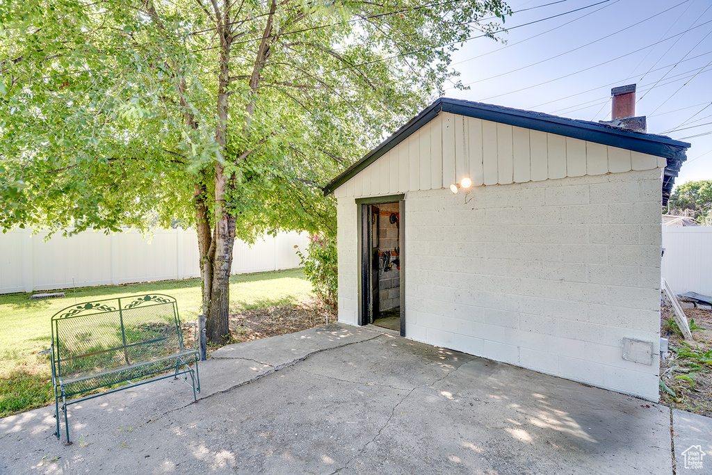 View of patio / terrace with an outbuilding