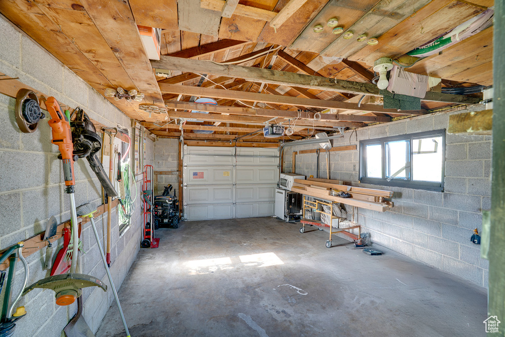 Garage featuring a garage door opener