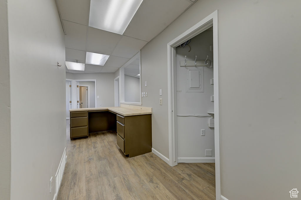 Bathroom with wood finished floors and vanity