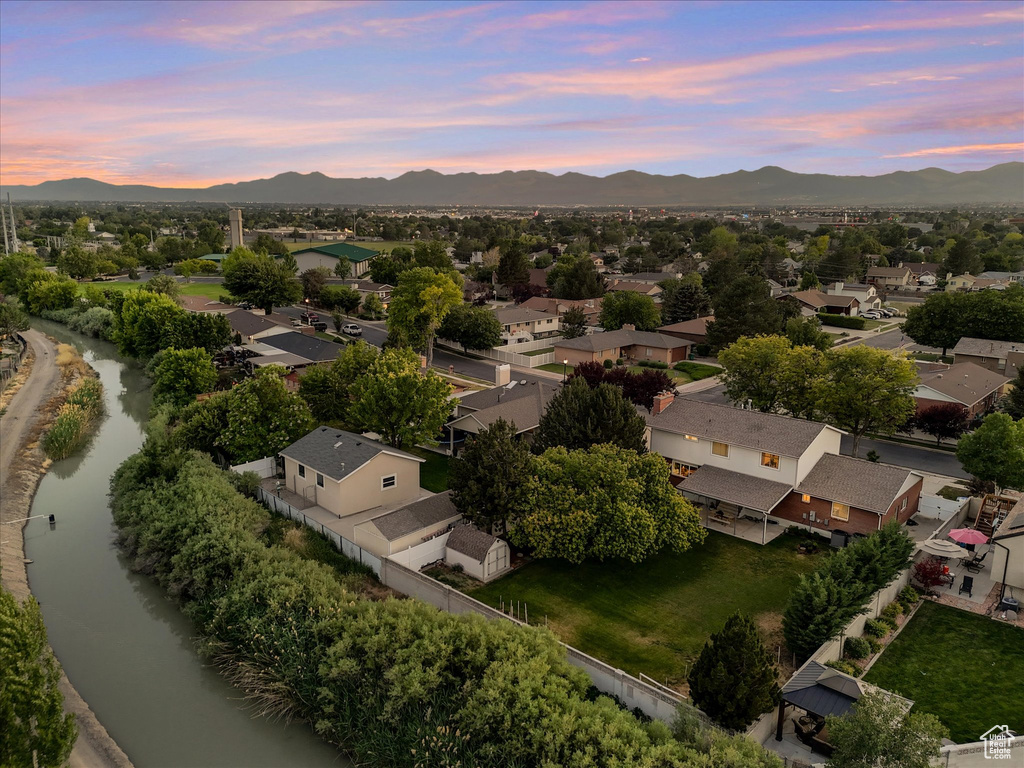 Aerial view at dusk of a mountain view and a residential view