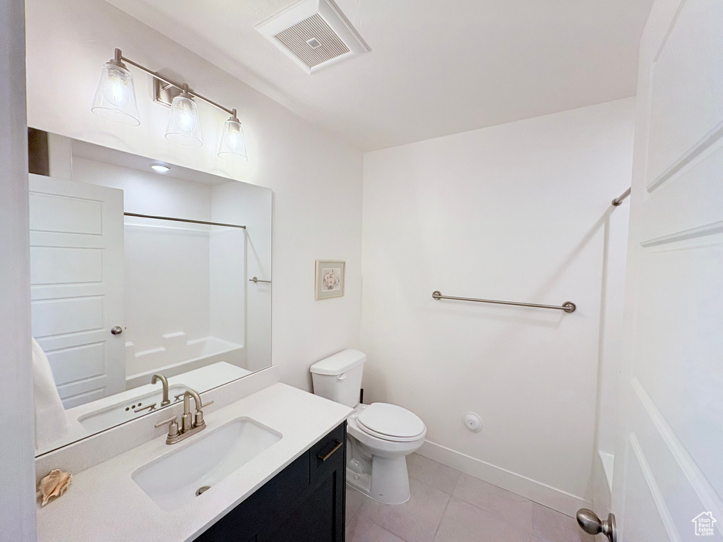 Full bathroom featuring vanity,  shower combination, and tile patterned floors