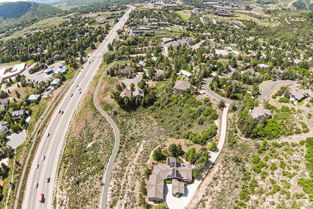 View of property location with nearby suburban area