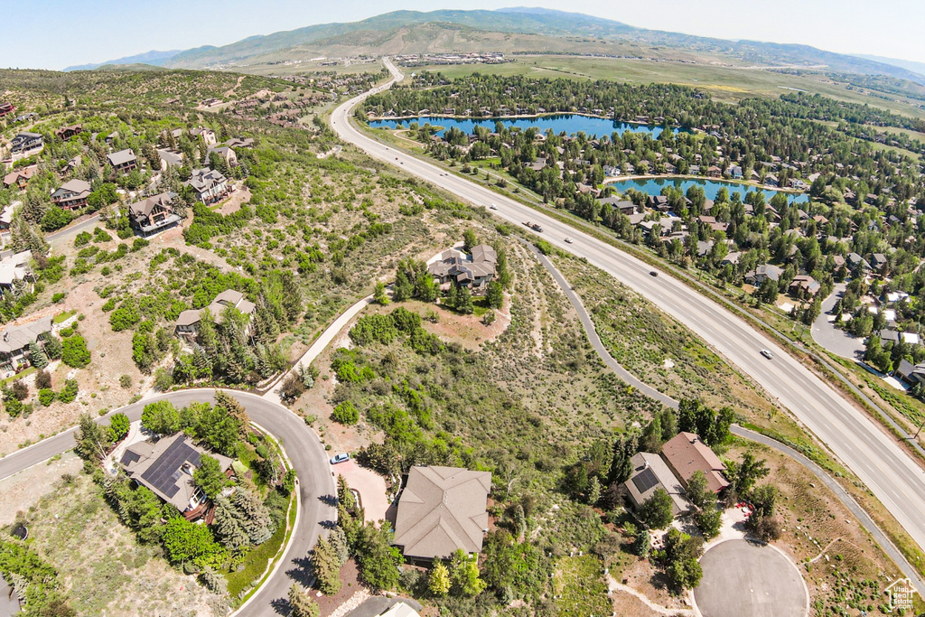 Aerial view of residential area with a water and mountain view