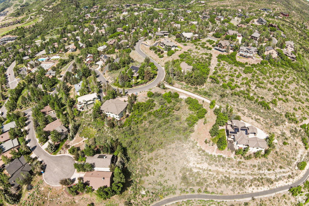 View of property location with nearby suburban area
