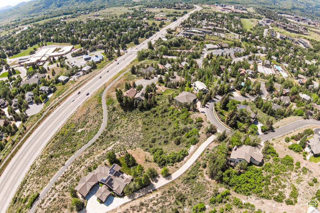 View of property location with nearby suburban area