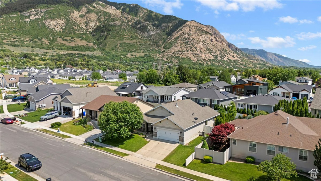 View of mountain backdrop with nearby suburban area