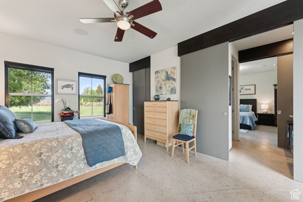 Bedroom featuring a ceiling fan